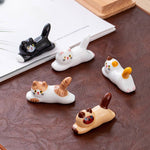 Load image into Gallery viewer, Gohobi Ceramic Lying Cat Chopstick Rest - Brown/White

