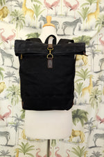 Load image into Gallery viewer, Black waxed canvas backpack

