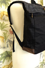 Load image into Gallery viewer, Black waxed canvas backpack
