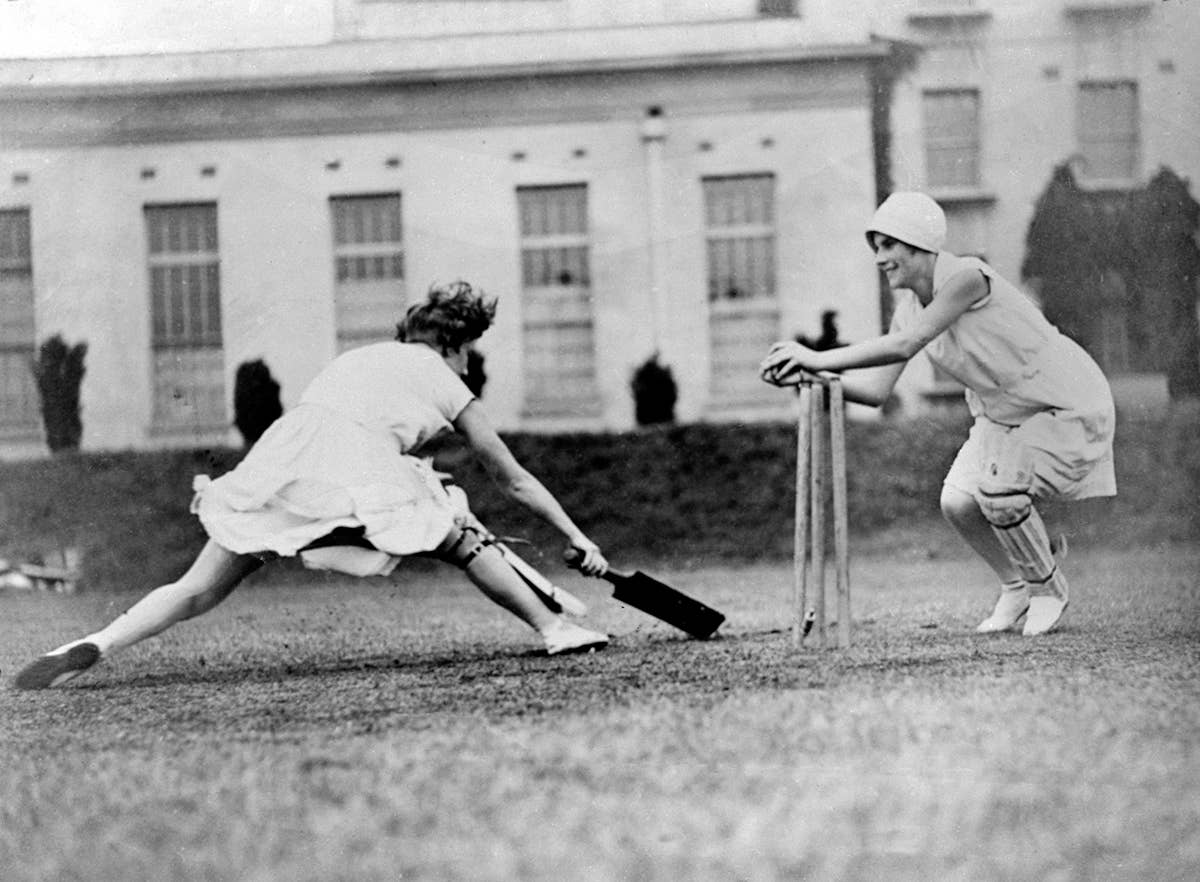 Women playing cricket blank greetings card