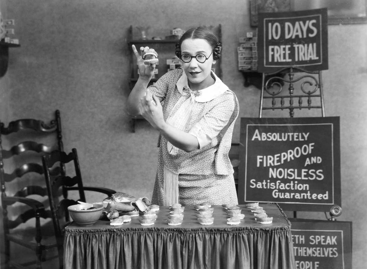 False teeth on display  blank retro card