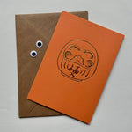 Load image into Gallery viewer, Daruma - hand foil block printed greeting card on recycled paper
