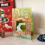 Load image into Gallery viewer, Crocodile Rock 3D die-cut kids jungle greetings card by Toby Rampton
