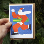 Load image into Gallery viewer, Running Santa Christmas Card: Blue
