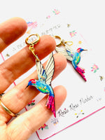 Load image into Gallery viewer, Colourful hummingbird dangle huggie hoop earrings by Rosie Rose Parker
