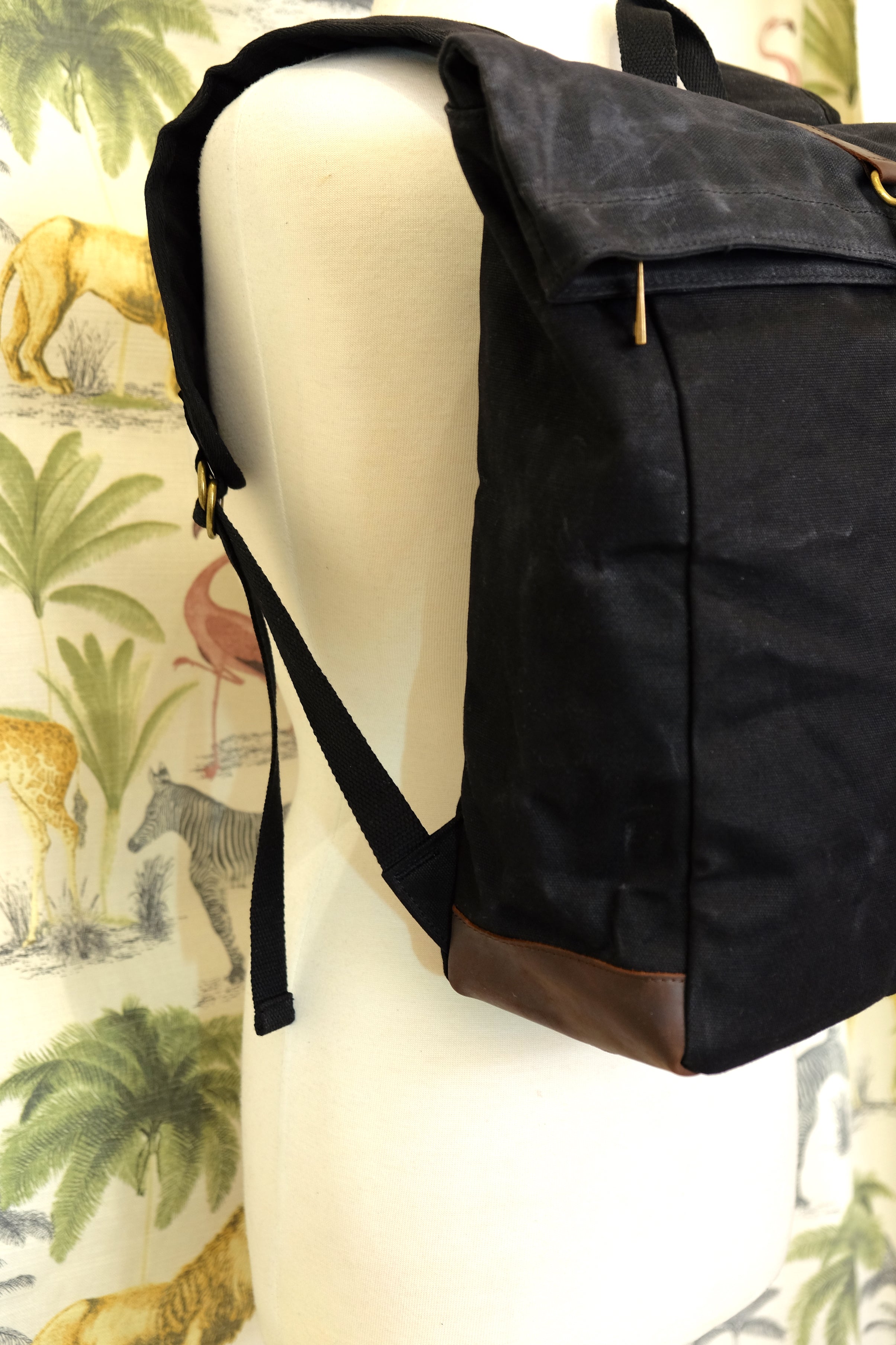 Black waxed canvas backpack