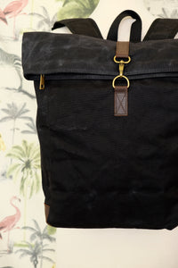 Black waxed canvas backpack